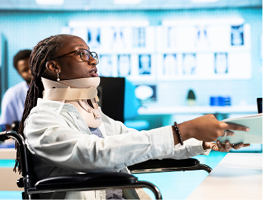 Person wearing neck support brace while working